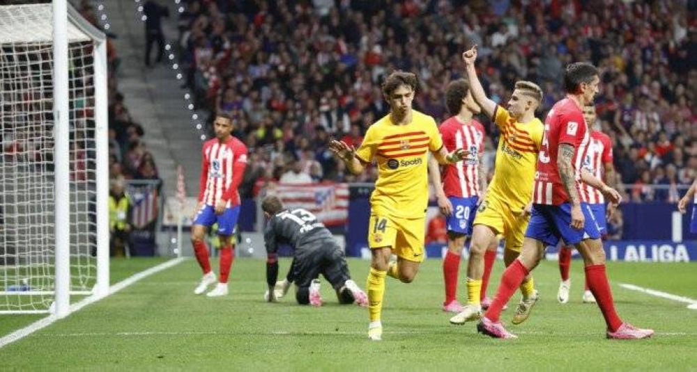 برشلونة يسحق أتلتيكو مدريد بثلاثية في الدوري الاسباني