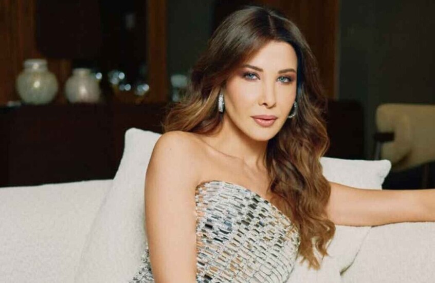 نانسي عجرم تحقق حلمها وتحتضن نجمها المصري المفضل ( صور )
